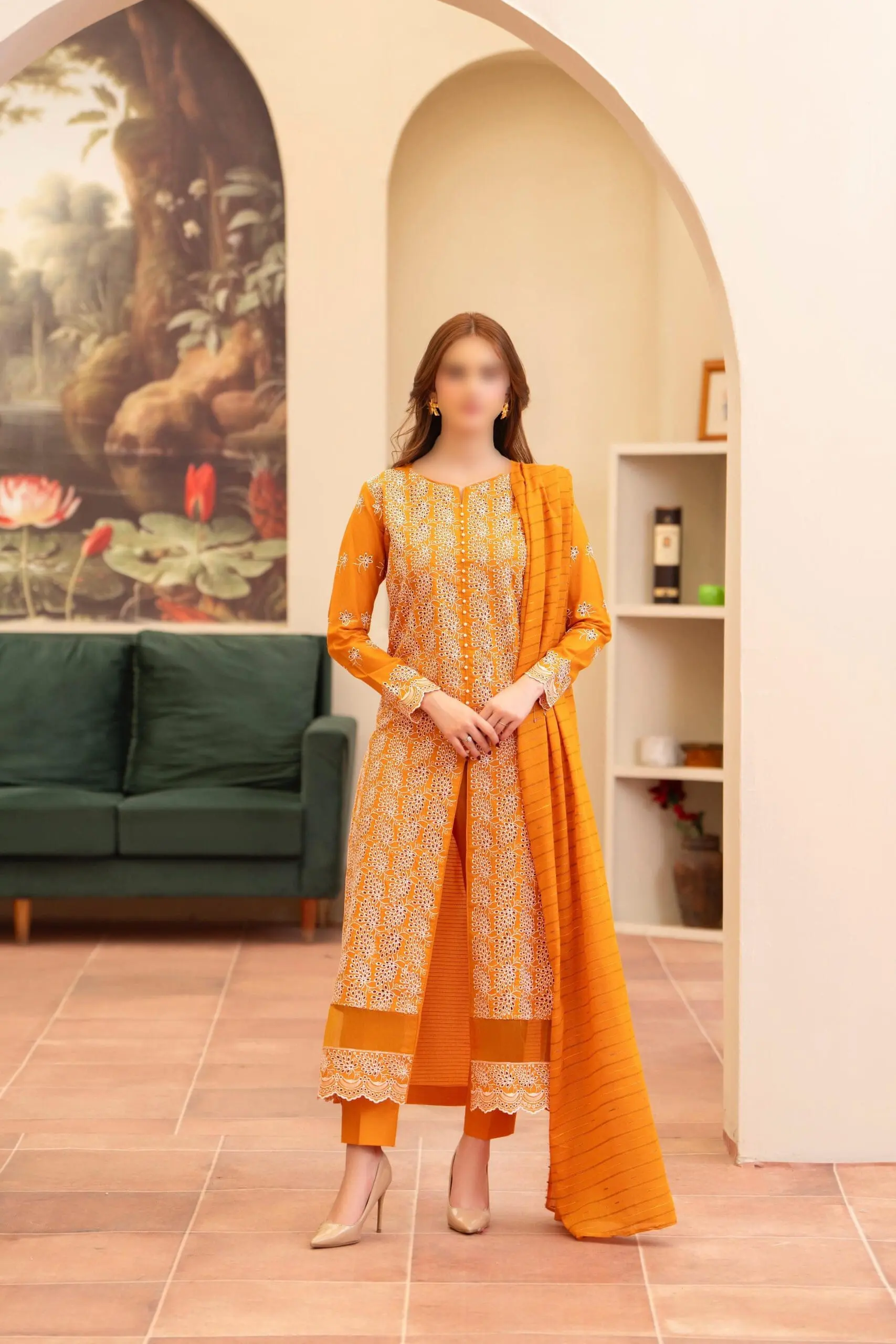 Merakhi 3PC lawn Chickenkari suit with laser-cut embroidery, embroidered sleeves, and mustard slub dupatta