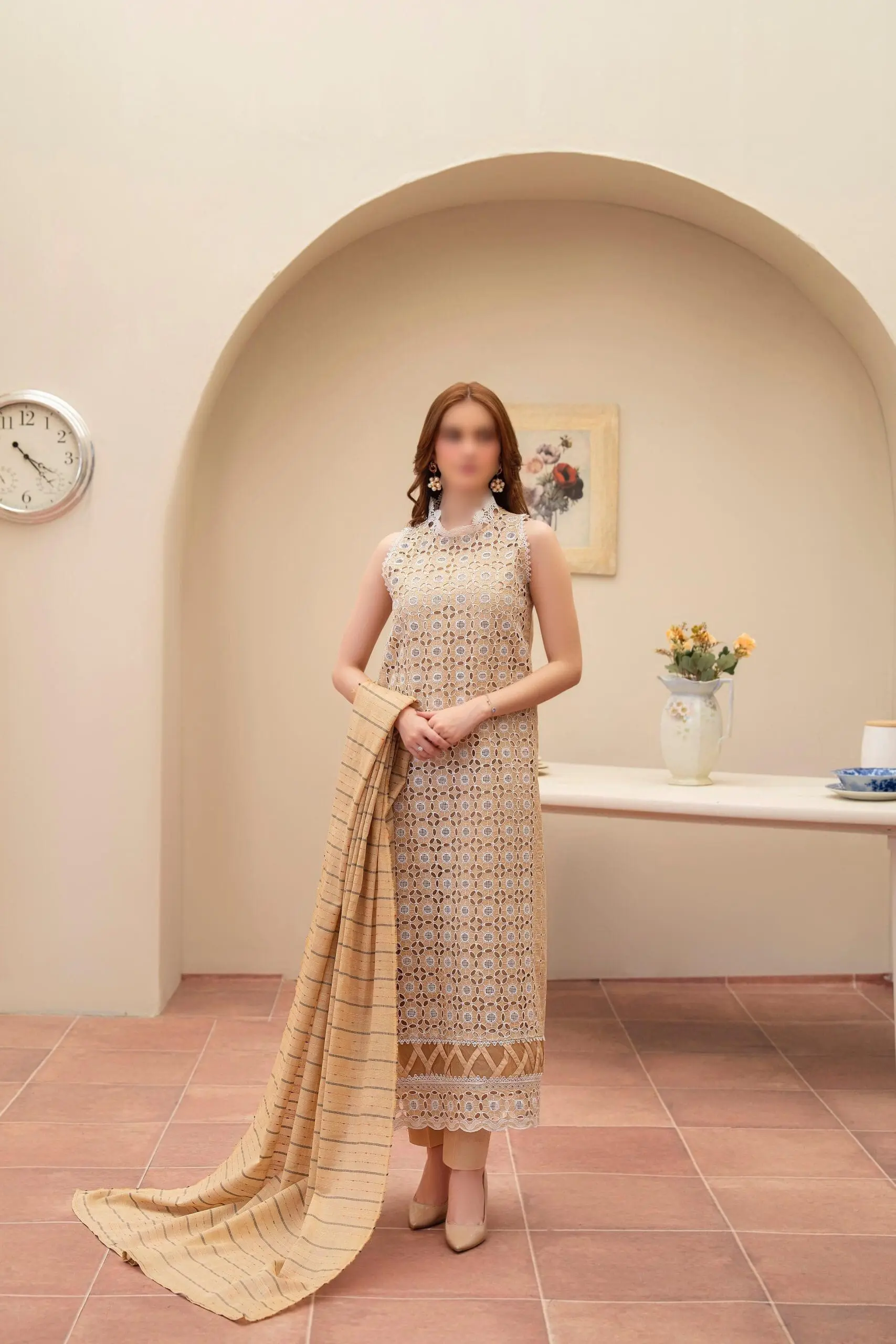 Merakhi 3PC lawn Chickenkari suit with laser-cut embroidery, embroidered sleeves, and skin slub dupatta