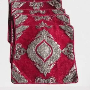 Set of 5 red cushion covers neatly arranged for sofa or bed décor