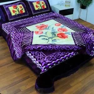 Spring Rose 4-piece velvet blanket set in purple floral design on double bed – includes flat sheet and pillowcases