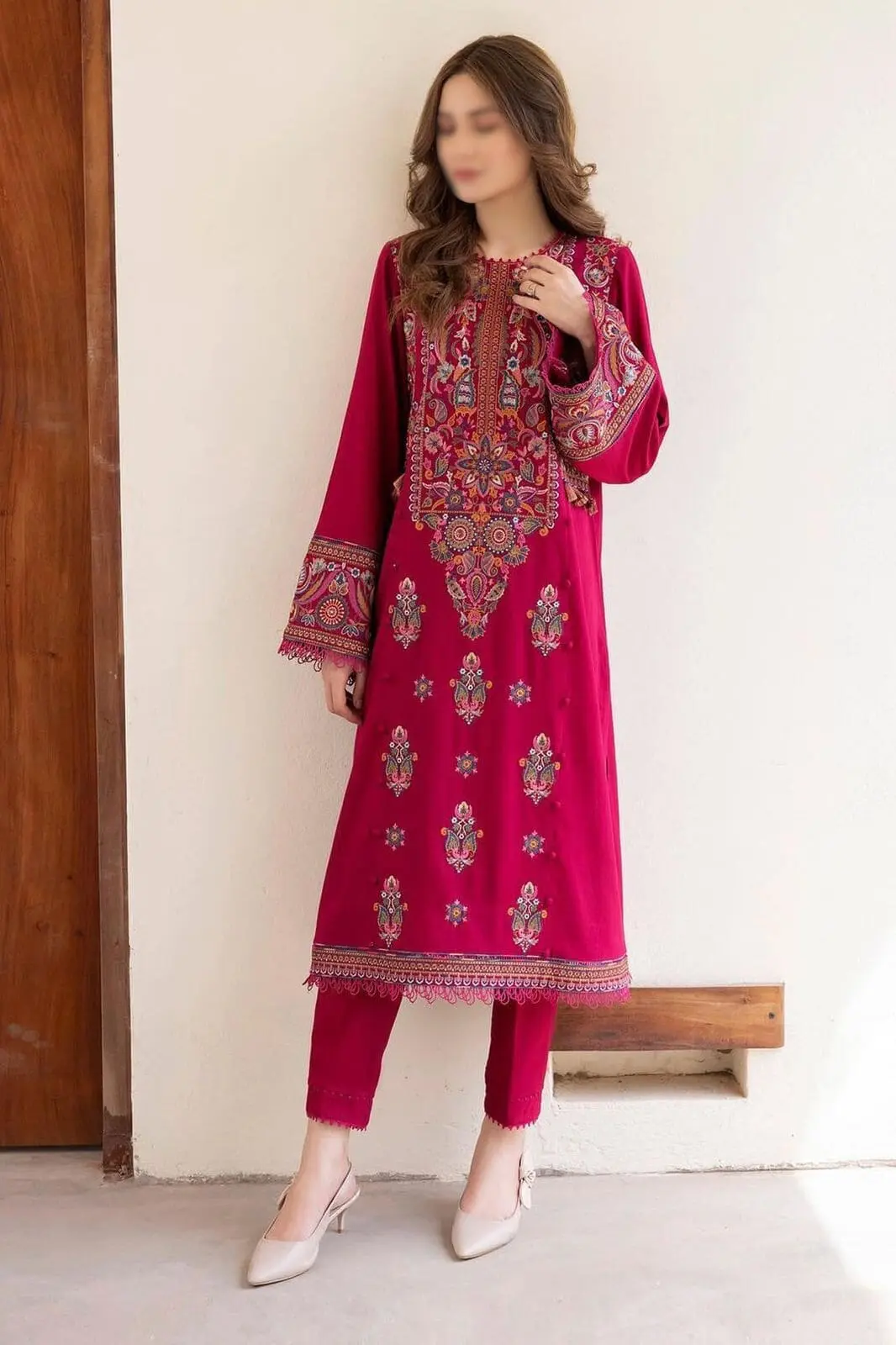 Model wearing front-open 2 piece unstitched airjet lawn suit in breathable summer fabric with printed shirt and plain trousers