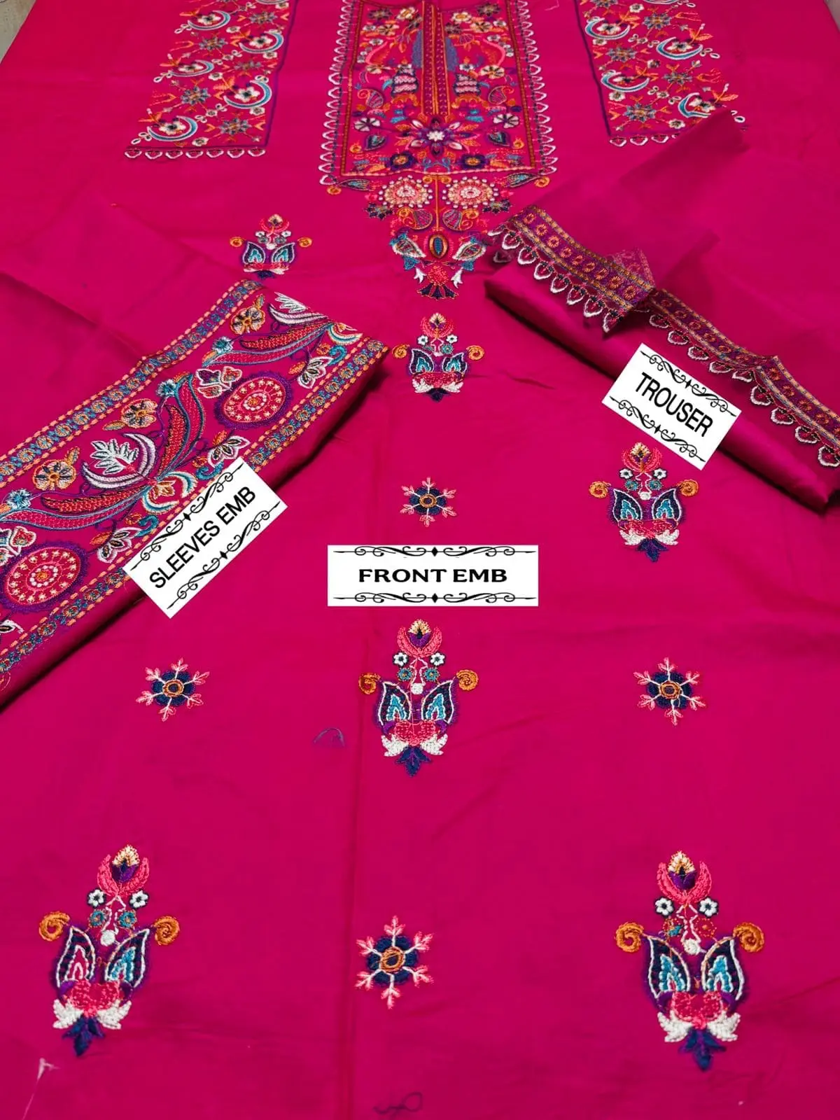 Front view of unstitched BATIK 2 piece lawn airjet suit with fully embroidered shirt, embroidered sleeves, and embroidered trouser patch