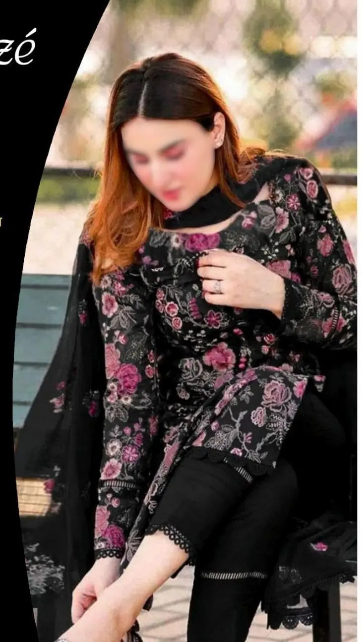 Model wearing Bareeze black embroidered lawn suit paired with chiffon dupatta, styled for an elegant summer look