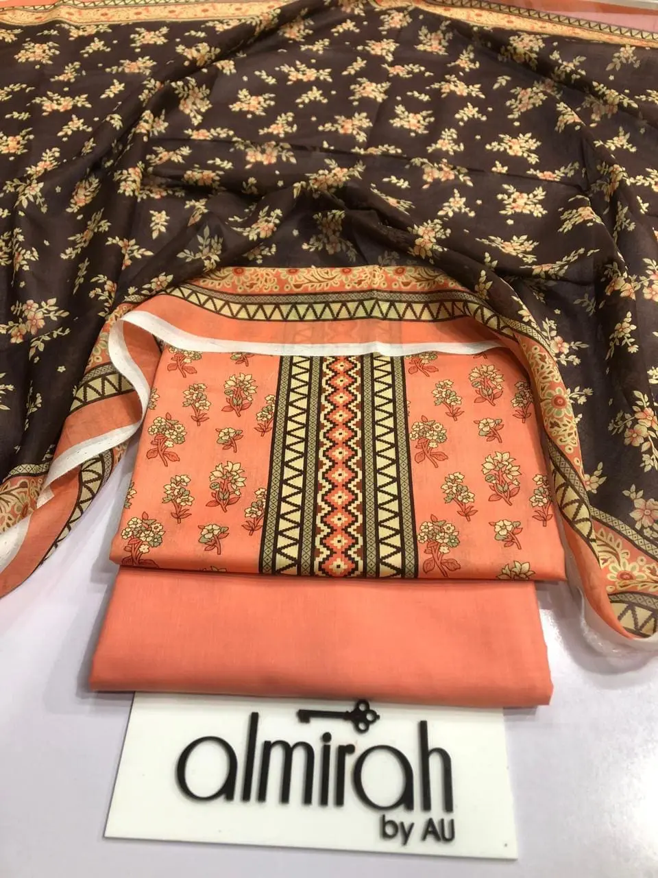 Almirah Design 14 – Orange Printed Lawn Suit with Voil Dupatta and Dyed Trousers