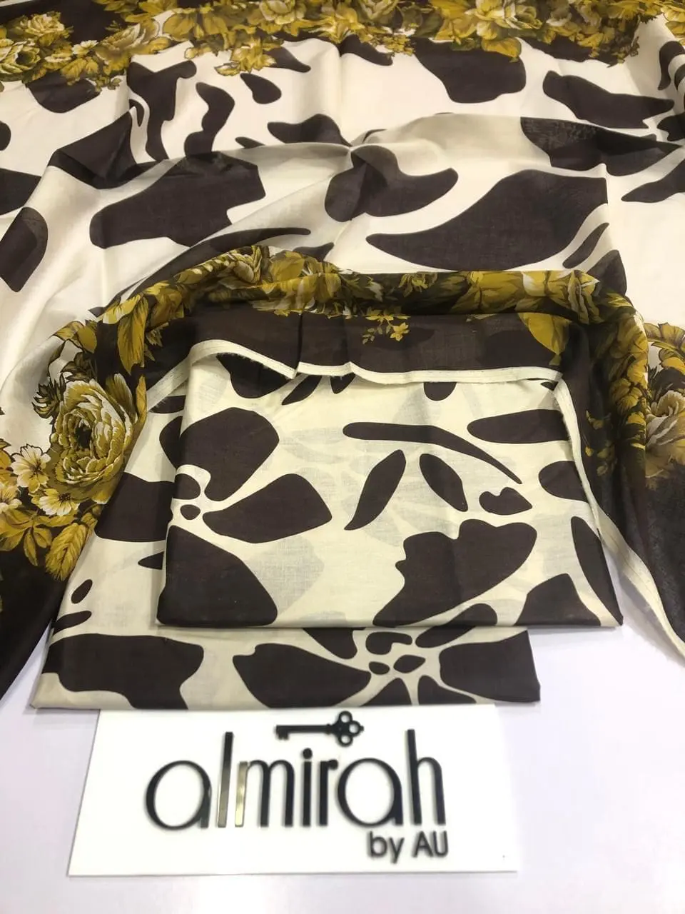 Almirah Design 20 – White Printed Lawn Suit with Voil Dupatta and Dyed Trousers