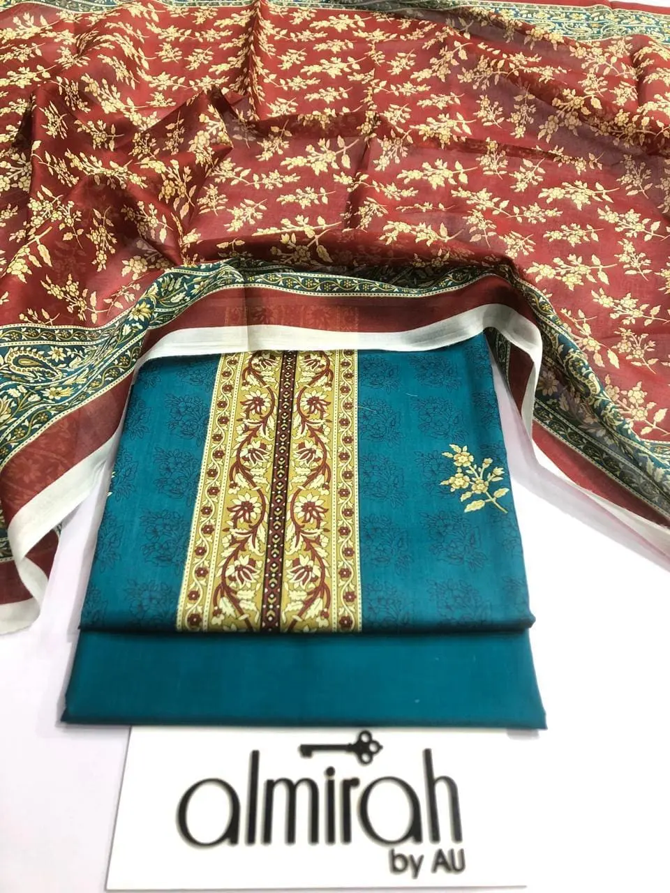 Almirah Design 22 – Zink Printed Lawn Suit with Voil Dupatta and Dyed Trousers