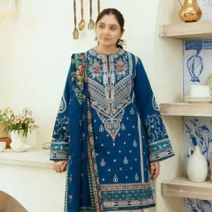 Model wearing COCO by Zara.J royal blue embroidered lawn suit styled with Tarkashi printed dupatta – Summer 2025