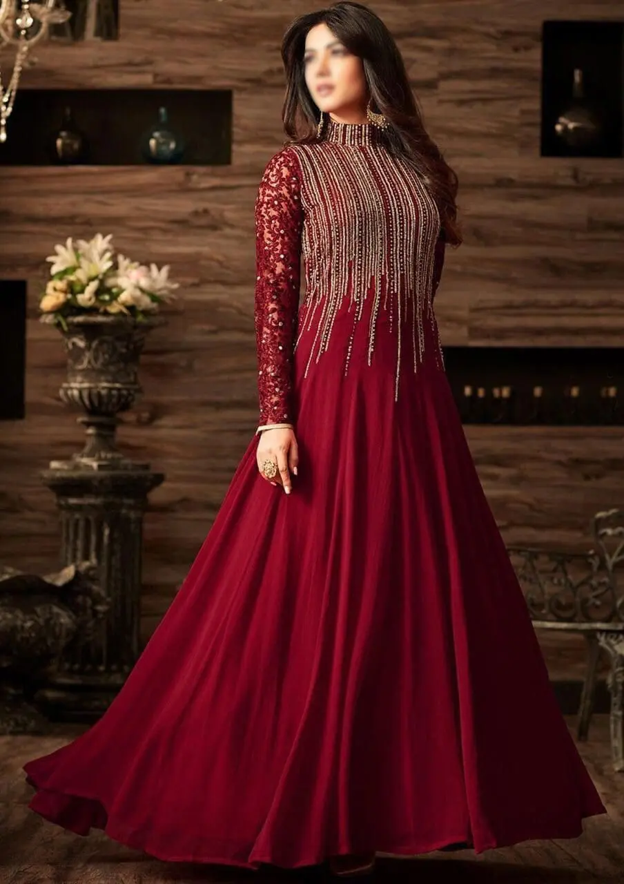 model wearing embroidered chiffon maxi suit showing details