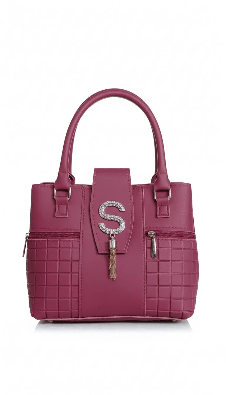 Maroon ladies handbag with crystal S charm, tassel, and textured design